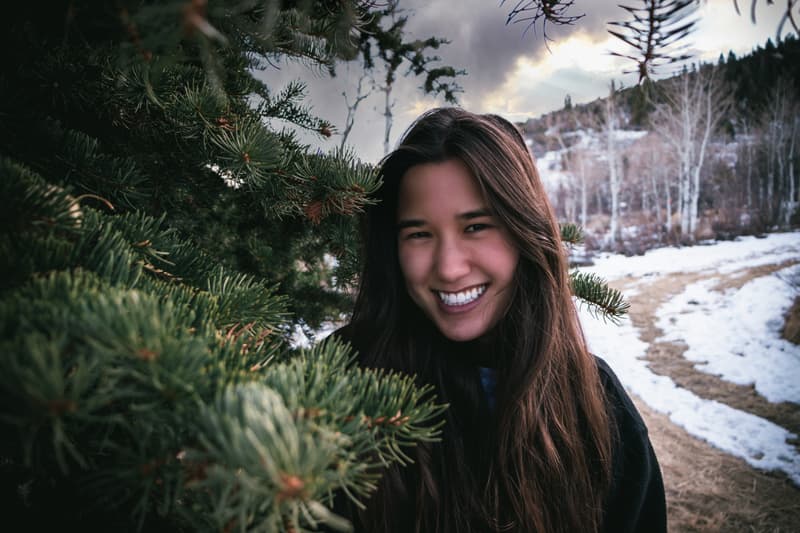 Sophia Chiang standing by a tree in Park City, Utah
