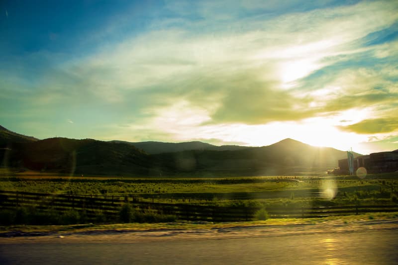 A sunset captured while driving by a field at 60mph