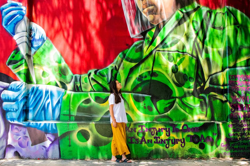 A girl admiring the iconic graffiti in San Francisco